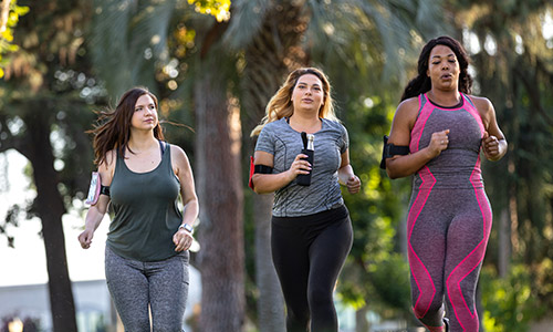 Three women jogging